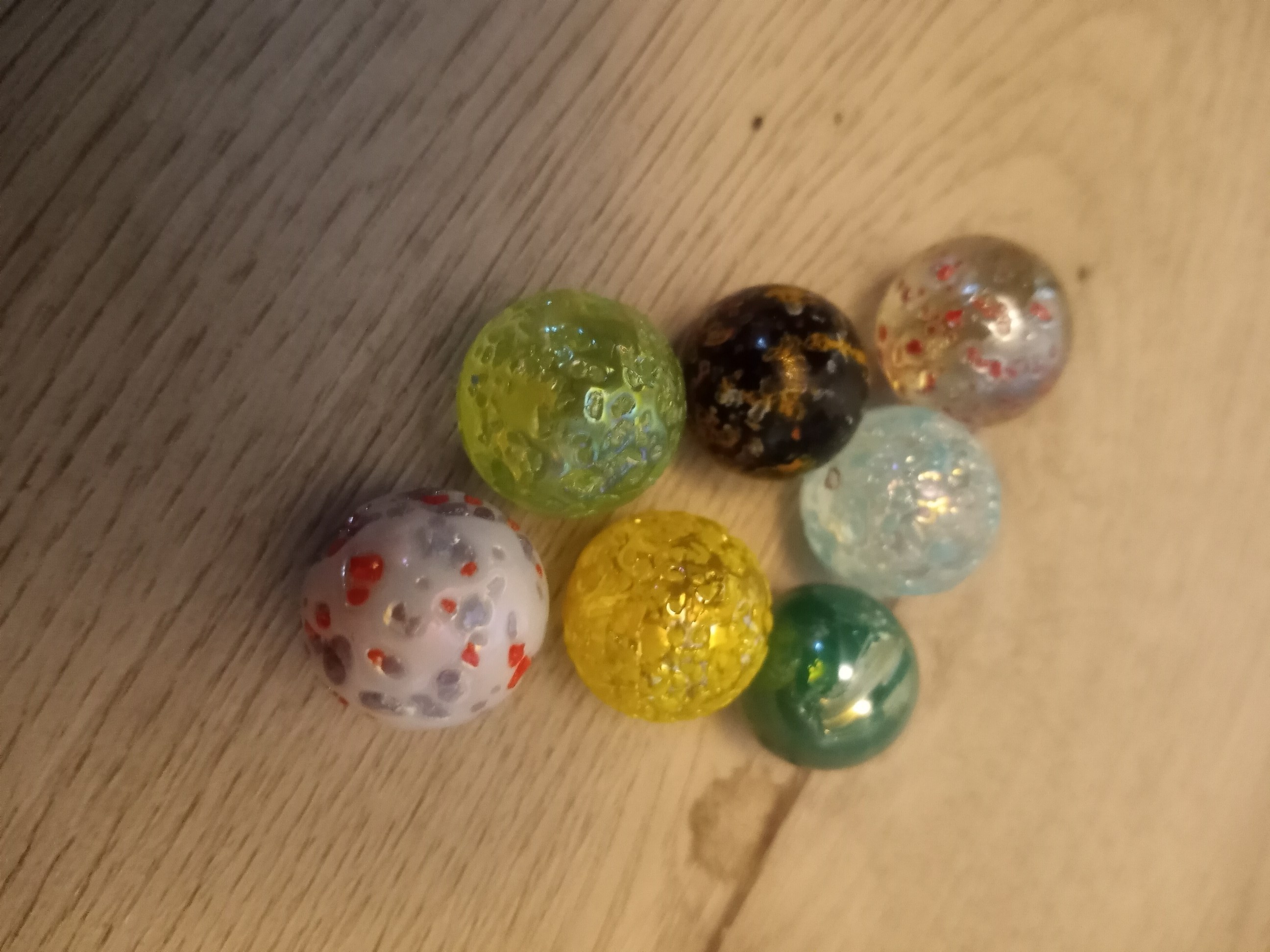 Jabo character marbles need help with identification of them Marble I