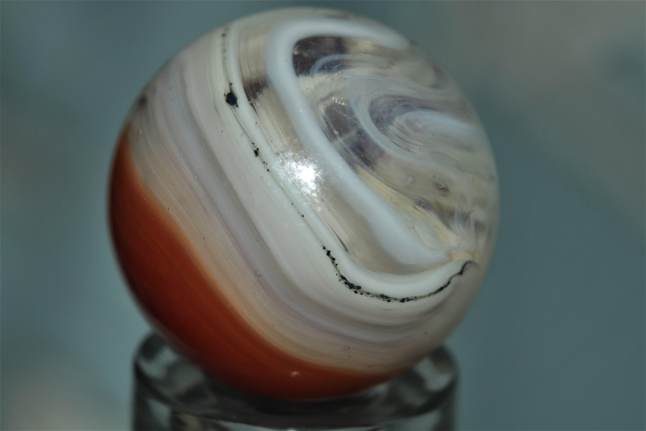 Any Idea what the black dots are? Marble I.D.'s Marble Connection